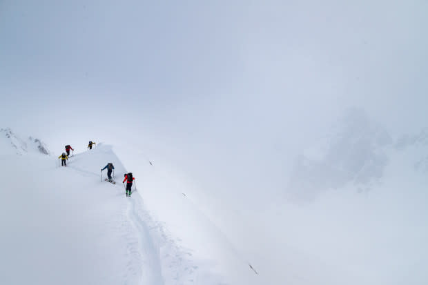 The whole group heading into the white zone of the alpine. 100 feet further on, visibility turned us around.<p>Photo: Mary McIntyre</p>