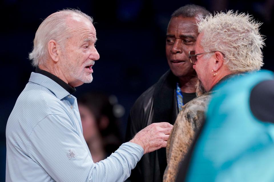 Bill Murray talks with Ahmad Rashad and Guy Fieri on Sunday, Feb. 18, 2024, ahead of the 73rd NBA All-Star game at Gainbridge Fieldhouse in downtown Indianapolis.