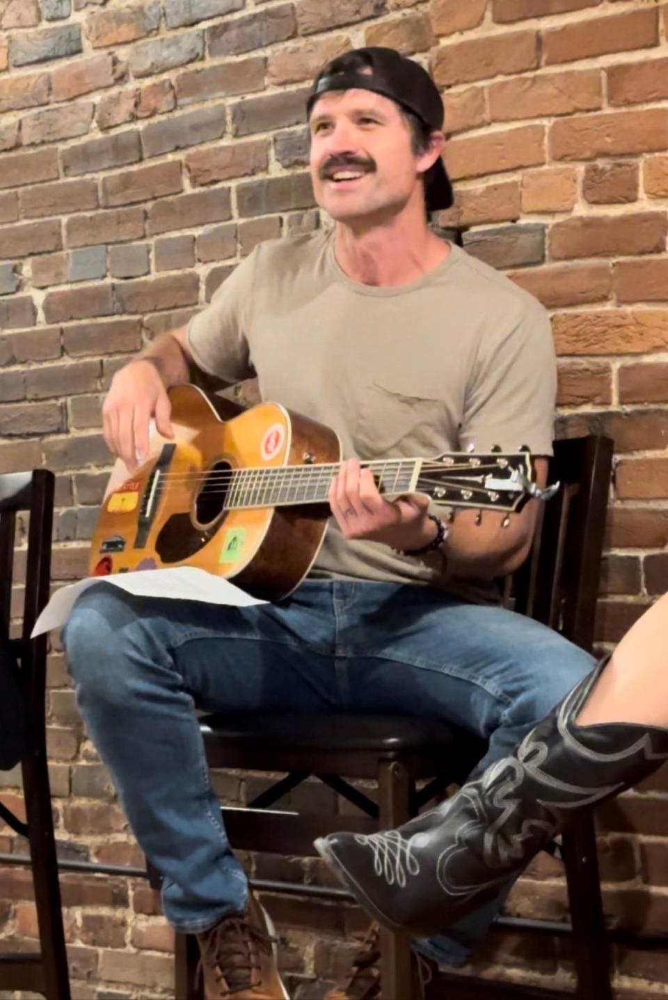 Musician Walker Hayes played his new song "Fancy Like Christmas" at his record label's holiday party. The song is being recorded and will be released in early November.