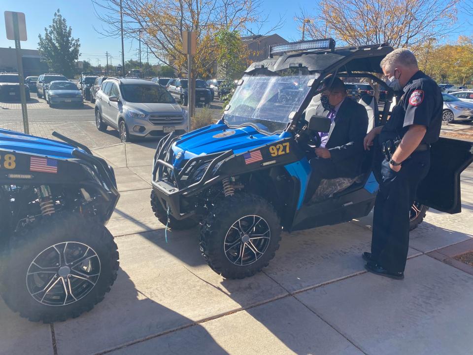 Pueblo Police Chief Troy Davenport, right, and Sgt. Frank Ortega test new utility task vehicles the department had acquired to reach places on rough terrain such as homeless camps. Last week health officials administered COVID-19 tests to homeless people along Fountain Creek.