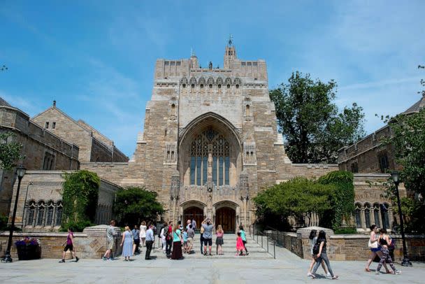 PHOTO: A tour group makes a stop at the Sterling Memorial Library on the Yale University campus in New Haven, June 12, 2015. (Craig Warga/Bloomberg via Getty Images, FILE)