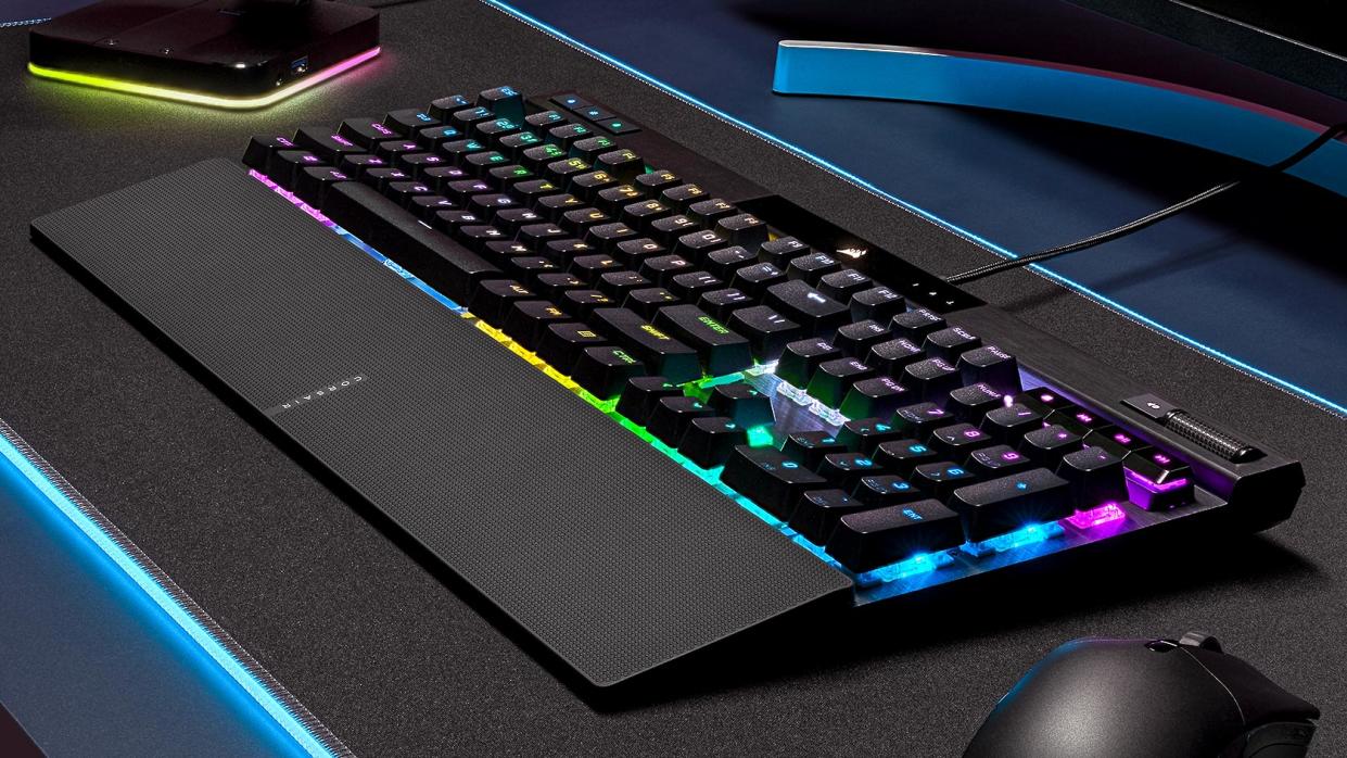  A Logitech G RGB Keyboard and gaming mouse on a desk. 