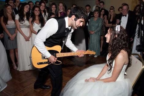 The author being serenaded by her husband on their wedding day!