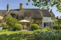 <p>Mill Cottage is a Grade II listed, four-bedroom property with an abundance of <a rel="nofollow noopener" href="http://www.housebeautiful.co.uk/decorate/looks/a1707/how-to-achieve-country-cottage-style-style-tips/" target="_blank" data-ylk="slk:country;elm:context_link;itc:0;sec:content-canvas" class="link ">country</a> character, reflecting the traditional Cotswold architecture. The thatched roof and other period features, including the large inglenook fireplace, wood burning stove and flagstone floor, add to its appeal. </p><p><em>This property is available for £700,000 through <a rel="nofollow noopener" href="http://www.knightfrank.com/properties/residential/for-sale/calf-lane-chipping-campden-gloucestershire-gl55/stw150020" target="_blank" data-ylk="slk:Knight Frank;elm:context_link;itc:0;sec:content-canvas" class="link ">Knight Frank</a>. </em></p>