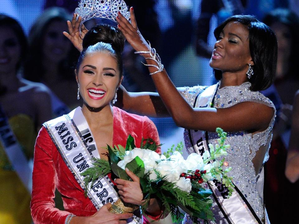 Miss USA 2012, Olivia Culpo (C), reacts as she is crowned the 2012 Miss Universe by Leila Lopes, Miss Universe 2011, during the 2012 Miss Universe Pageant at PH Live at Planet Hollywood Resort & Casino on December 19, 2012 in Las Vegas, Nevada.