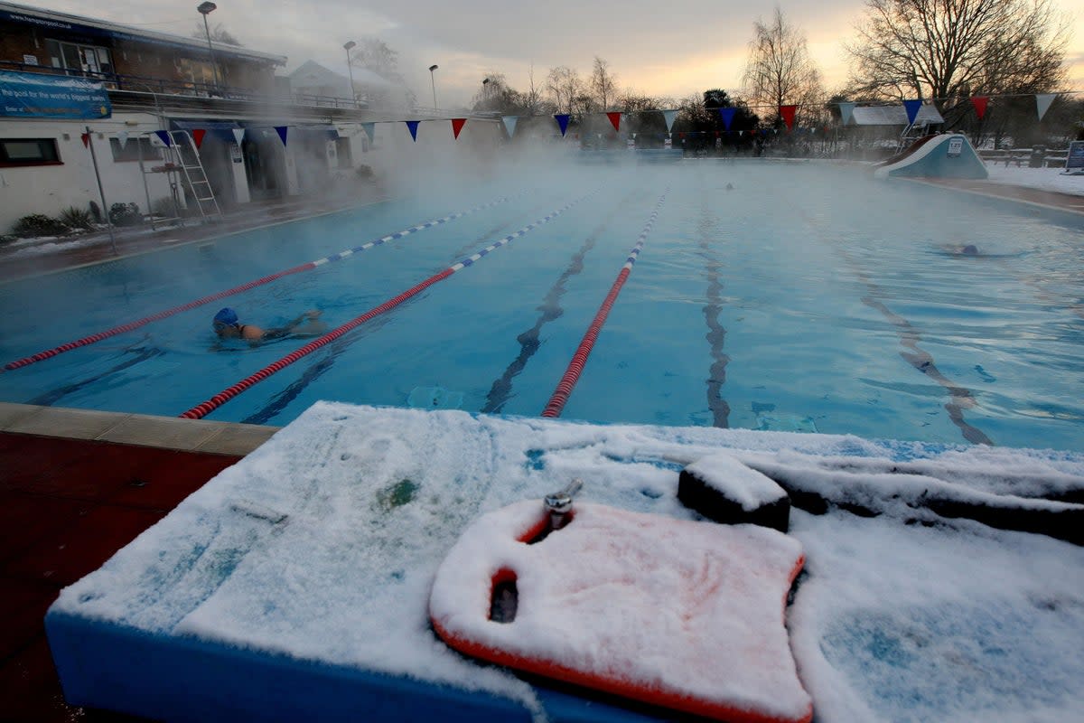 Experts said that education is also needed on the health risks associated with taking a dip in icy water (Steve Parsons/PA) (PA Archive)