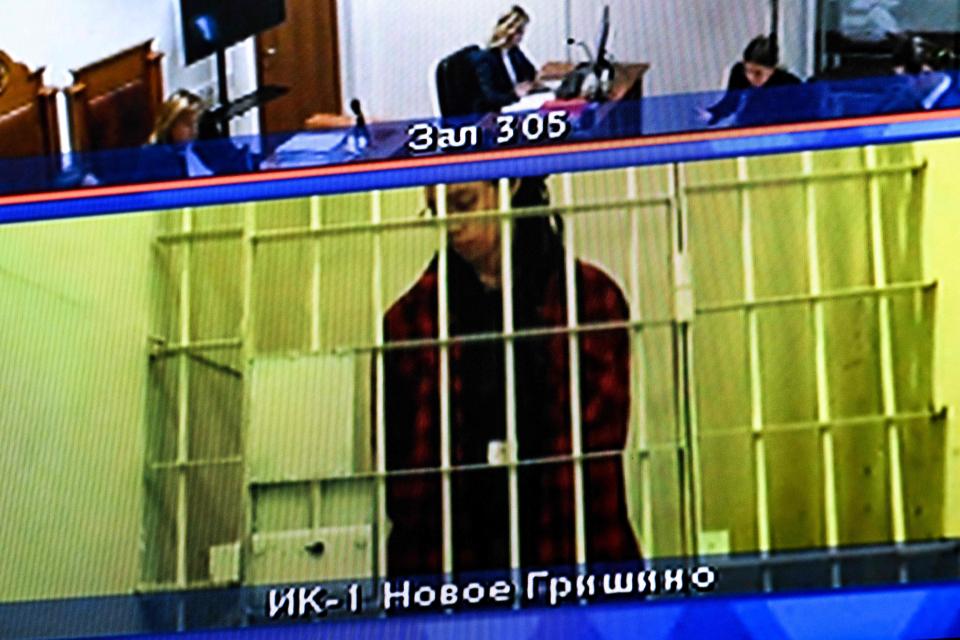 US basketball player Brittney Griner, who was sentenced to nine years in a Russian penal colony in August for drug smuggling, is seen on a screen via a video link from a remand prison during a court hearing to consider an appeal against her sentence, at the Moscow regional court on October 25, 2022. - The two-time Olympic basketball gold medallist and Women's NBA champion was detained at a Moscow airport in February after she was found carrying vape cartridges with cannabis oil in her luggage. (Photo by Kirill KUDRYAVTSEV / AFP) (Photo by KIRILL KUDRYAVTSEV/AFP via Getty Images)