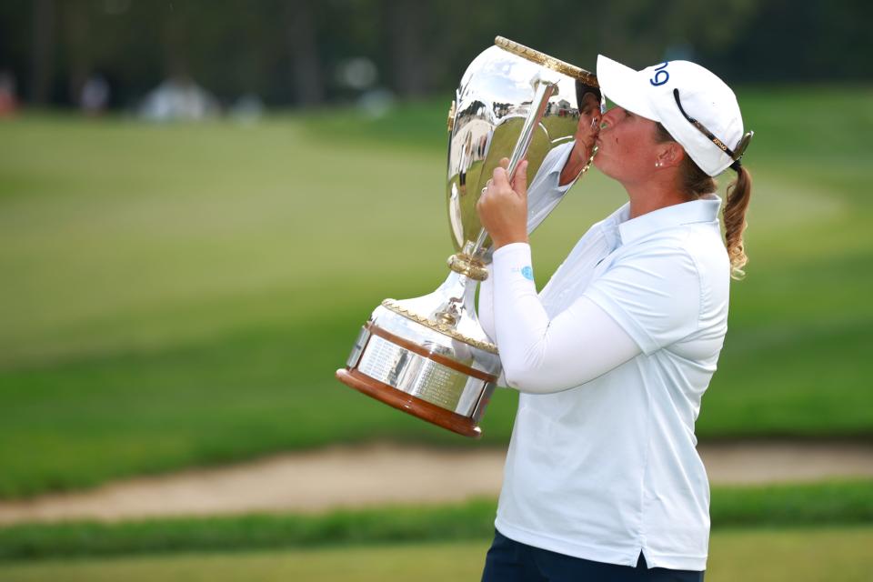 Lauren Coughlin poses with the trophy after winning the 2024 CPKC Women's Open at Earl Grey Golf Club in Calgary, Alberta. (Vaughn Ridley/Getty Images)