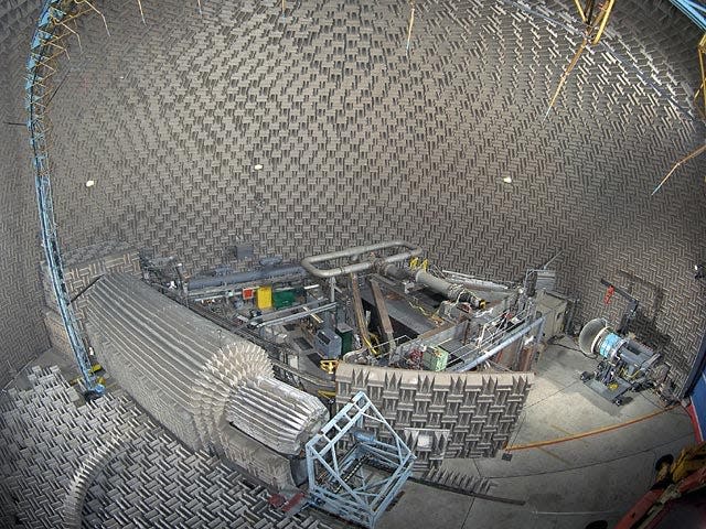 Fish-eye, ariel view of the entire inside of NASA's dome-shaped Aero-Acoustic Propulsion Laboratory.