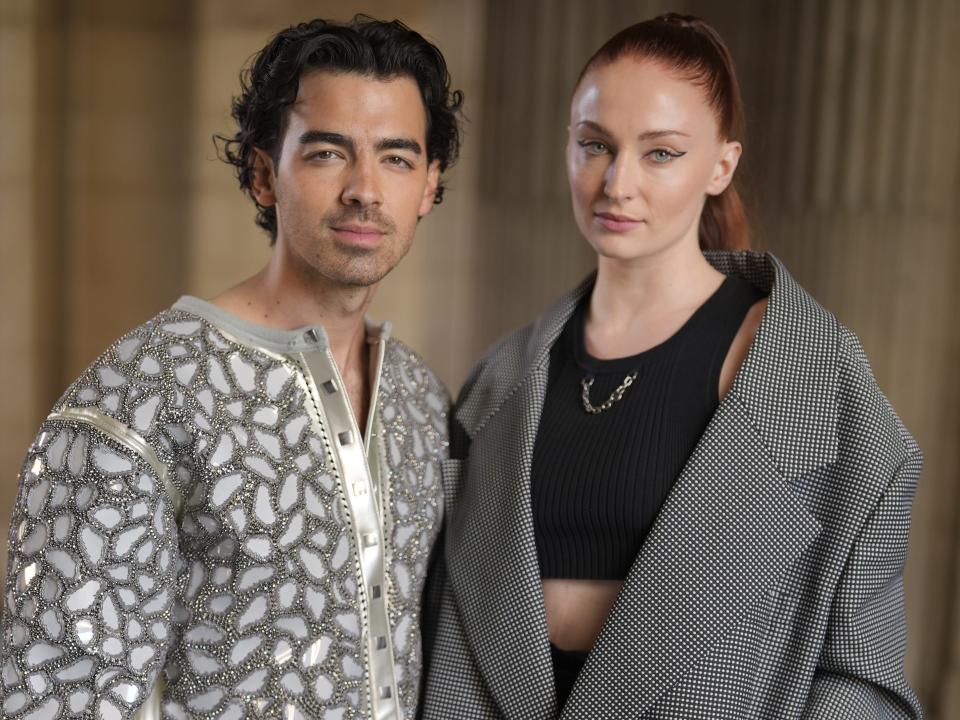 Joe Jonas and Sophie Turner in front row at Louis Vuitton RTW Spring 2023 photographed on October 04, 2022 in Paris, France.