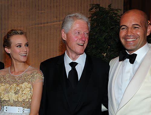 Diane Kruger, Bill Clinton and Billy Zane pose for a photo at the charity gala. Credit: Getty Images.