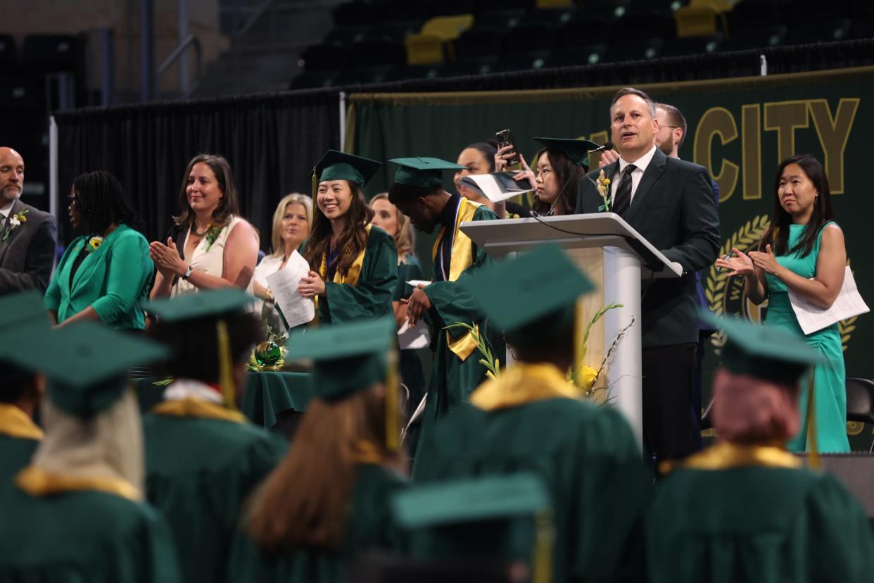 West High principal Mitch Gross speaks welcomes students to their commencement ceremony at the Xtream Arena in Coralville on Saturday, June 3, 2023.