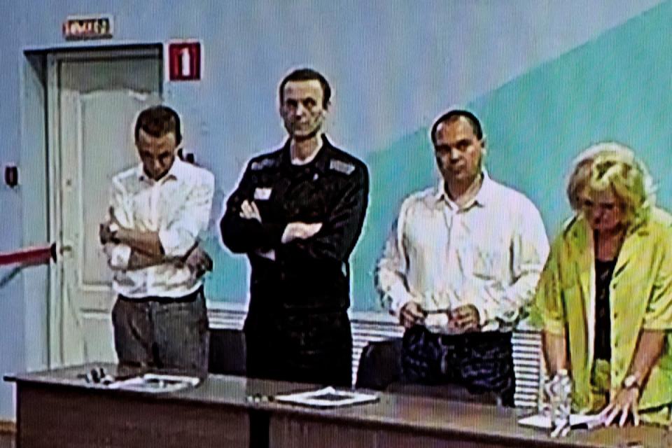 Navalny (second left) as he listens to his verdict over a series of extremism charges at the IK-6 penal colony (AFP via Getty Images)