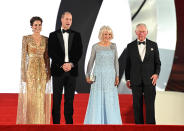 <p>The Duchess of Cambridge and Prince William, joined the Duchess of Cornwall and Prince Charles, on the red carpet for the 2021 James Bond film <em>No Time To Die</em> World. Kate wore a gilded, caped Jenny Packham dress for the occasion, whilst Camilla opted for a pale blue embellished gown. (Getty Images)</p> 