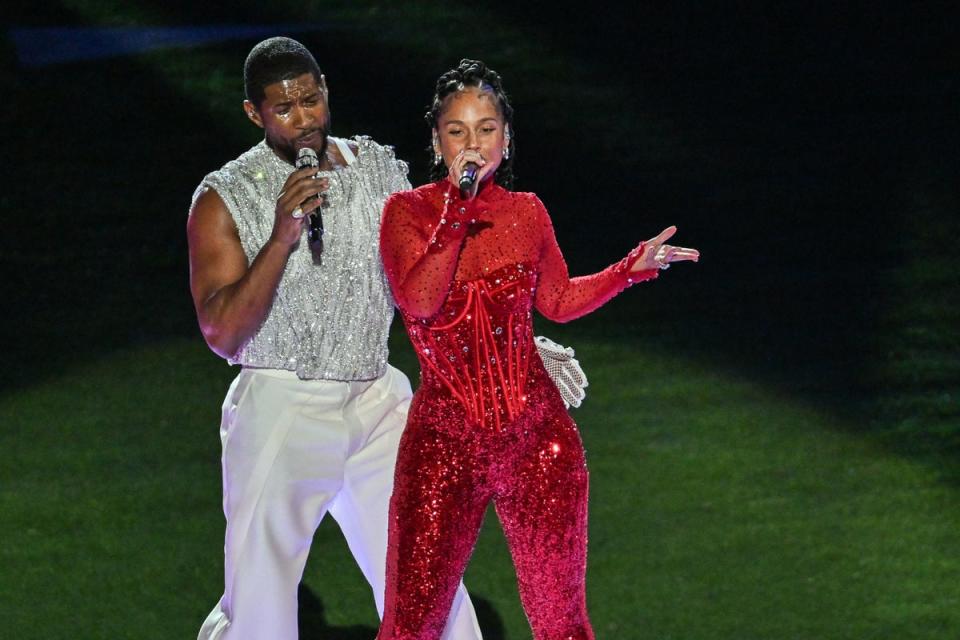 Usher performs with Alicia Keys at the Super Bowl (PA)
