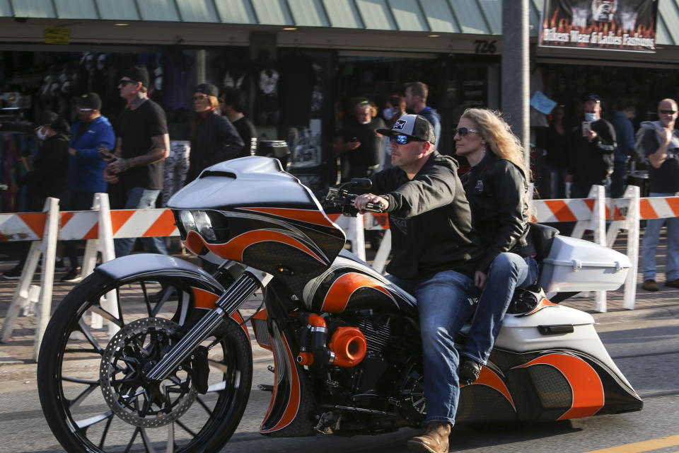 Bikers ride up and down Main Street in Daytona, Fla., during the start of Bike Week on Friday, March 5, 2021. (Sam Thomas /Orlando Sentinel via AP)