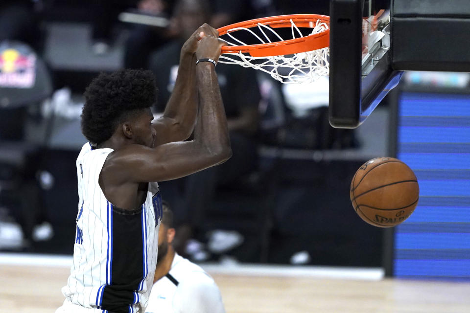 Jonathan Isaac dunking for the Orlando Magic.