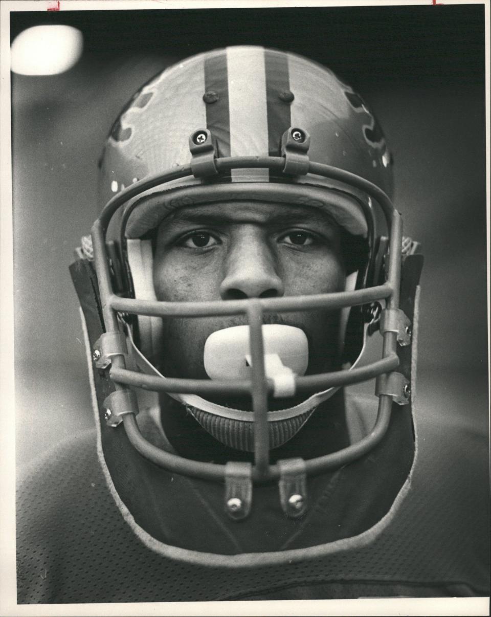 Leonard Thompson with his new helmet to protect his jaw.