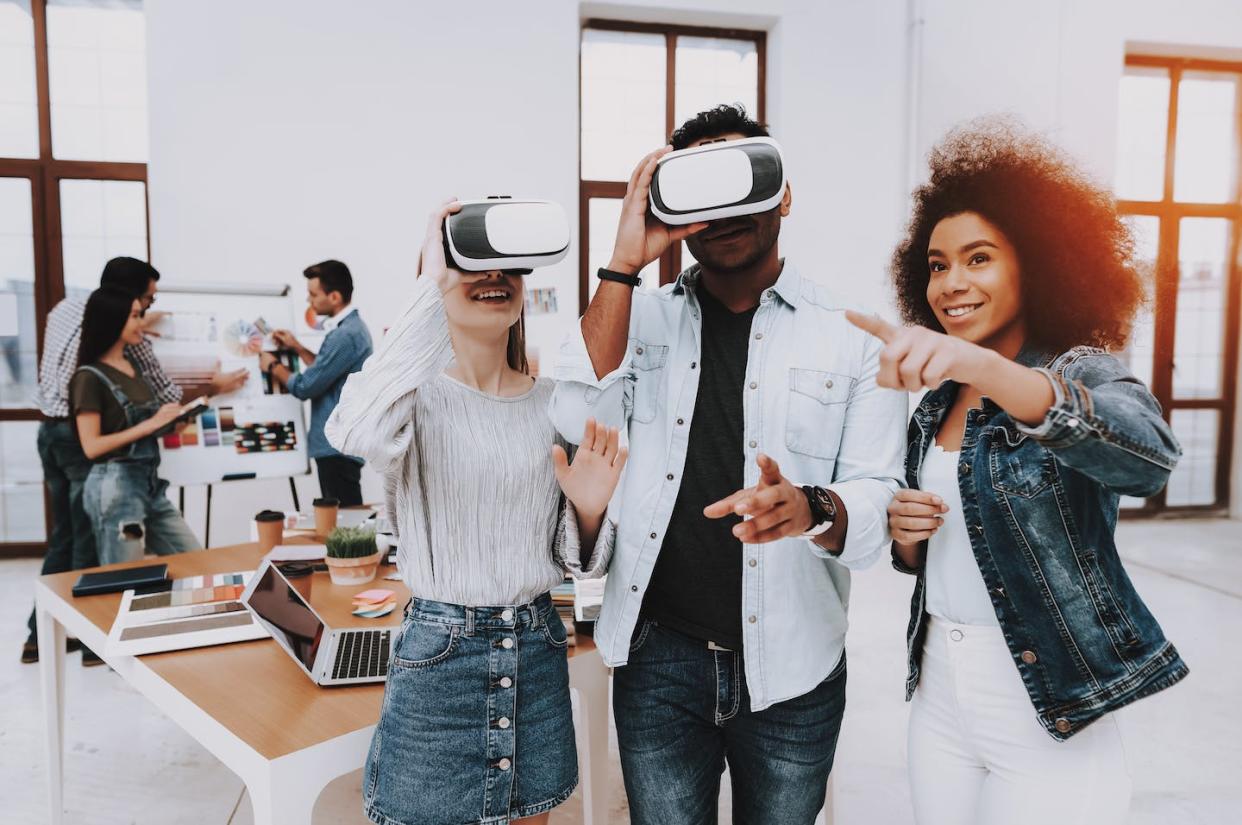 Colleges are offering more virtual reality experiences as they become 'metaversities.' <a href="https://www.gettyimages.com/detail/photo/brainstorming-virtual-reality-glasses-look-royalty-free-image/1051052494?adppopup=true" rel="nofollow noopener" target="_blank" data-ylk="slk:vadimguzhva via Getty Images;elm:context_link;itc:0;sec:content-canvas" class="link ">vadimguzhva via Getty Images</a>