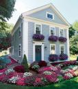 <p>Overflowing with your favorite flowers, window boxes are a irresistible draw for the eye. Consider planting flowers in a shade that complements the color of your home. Or, for dramatic effect, mix in a second plant that picks up your trim color. </p>