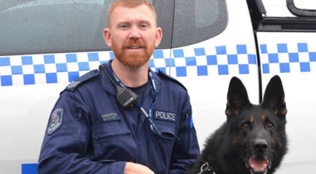 Senior Constable Warburton with his beloved dog Chuck. Photo: 7 News