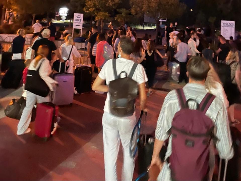 Going places? easyJet passengers outside Tivat airport after their flight was cancelled (Joanna Lonergan)