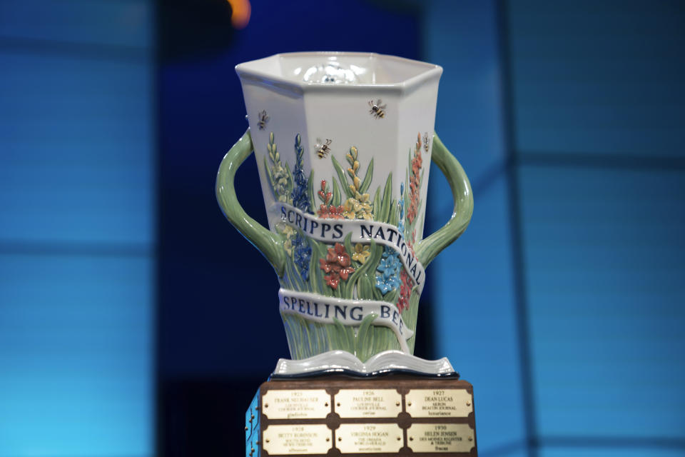 The Scripps National Spelling Bee trophy is seen on the stage ahead of the first round of the Scripps National Spelling Bee, Tuesday, May 30, 2023, in Oxon Hill, Md. (AP Photo/Nathan Howard)