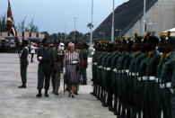 Queen Elizabeth II inspecting a guard of honour mounted by the Barbados Regiment on her arrival in Bridgetown, Barbados, during her Silver Jubilee tour of the Caribbean.