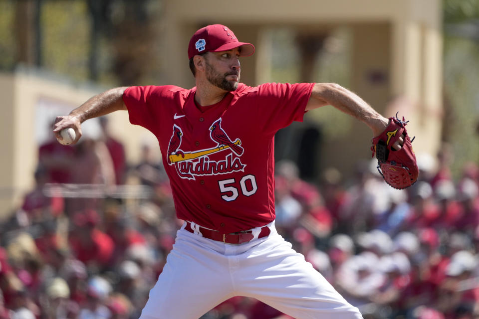 St. Louis Cardinals starting pitcher Adam Wainwright throws during the first inning of a spring training baseball game against the Houston Astros Thursday, March 2, 2023, in Jupiter, Fla. (AP Photo/Jeff Roberson)