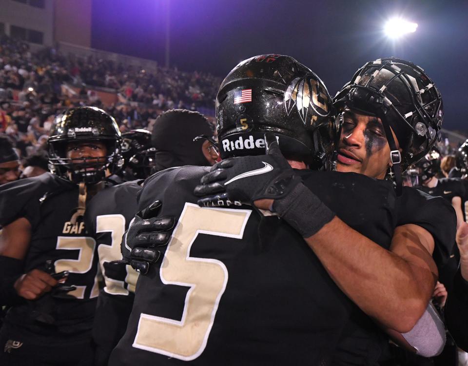The Gaffney Indians take on the Dutch Fork Silver Foxes in the SCHSL AAAAA State Championship football game, held at Benedict College in Columbia, Saturday evening, December 4, 2021. Gaffney celebrates their state championship win after the game Saturday.