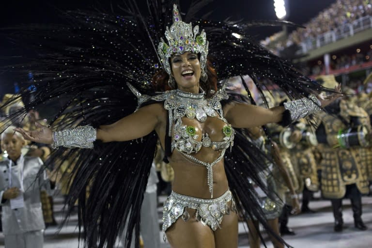 Amid the feather headdresses, sparkly G-strings and dancers dressed as everything from trees to Chinese merchants, serious politics intruded this year's samba parades