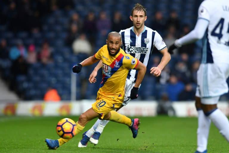 Crystal Palace's Andros Townsend runs with the ball during their English Premier League football match against West Bromwich Albion in West Bromwich, central England, on March 4, 2017 Crystal Palace won the game 2-0