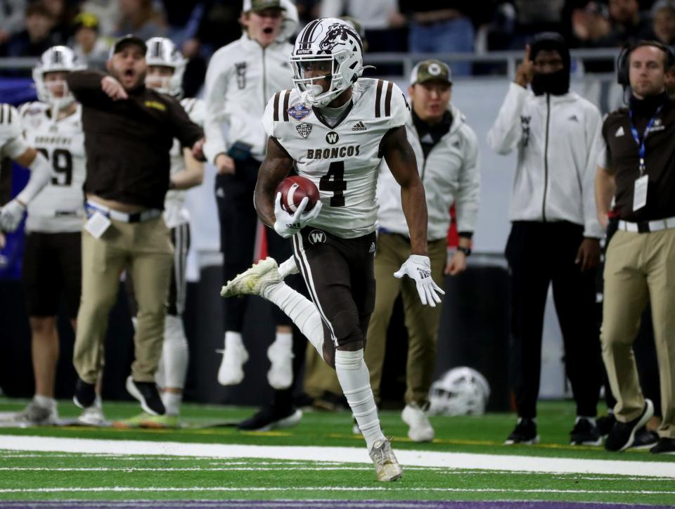 Western Michigan wide receiver Corey Crooms catches a touchdown pass against Nevada during the first half of the Quick Lane Bowl on Monday, Dec. 27, 2021, at Ford Field.