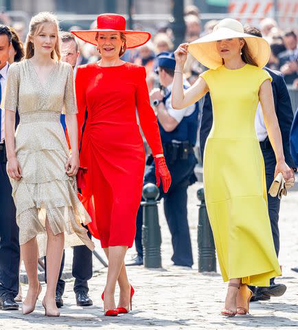 <p>Patrick van Katwijk/Getty Images</p> Princess Eleonore of Belgium, Queen Mathilde of Belgium and Princess Elisabeth of Belgium attend the Te Deum mass on July 21.