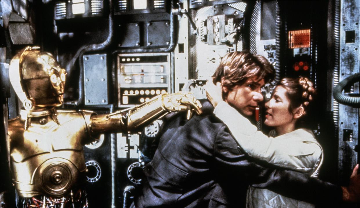 Anthony Daniels as C-3PO, Harrison Ford as Han Solo and Carrie Fisher as Princess Leia in <em>Star Wars: The Empire Strikes Back</em>. (20th Century Fox/Lucasfilm/courtesy Everett Collection)