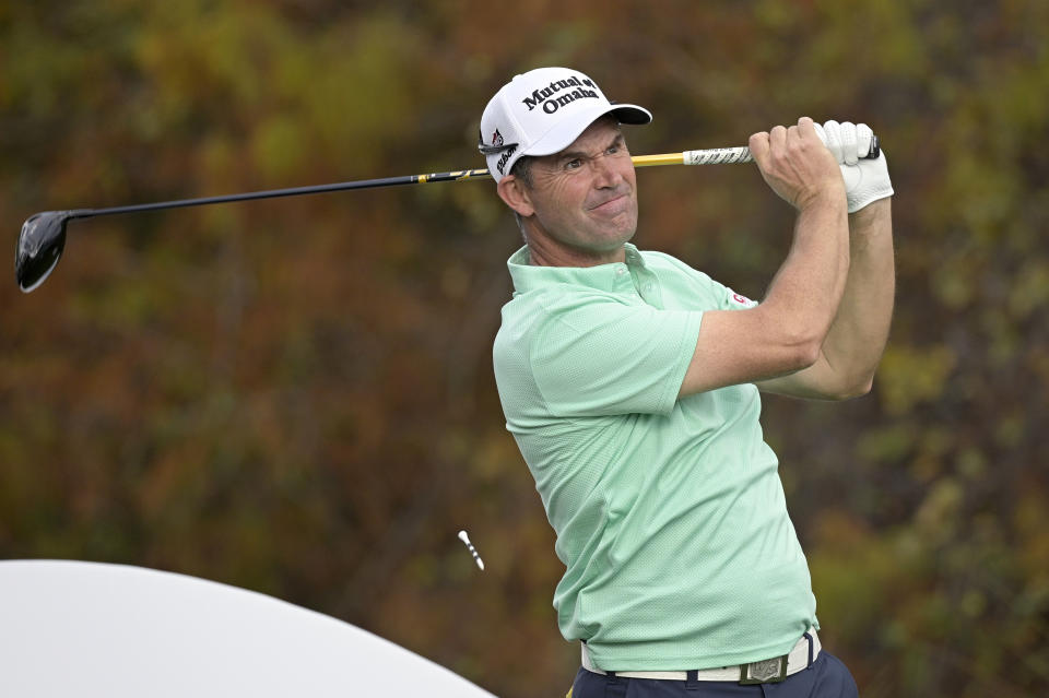 Padraig Harrington, of Ireland, tees off on the 18th hole during the first round of the PNC Championship golf tournament, Saturday, Dec. 19, 2020, in Orlando, Fla. (AP Photo/Phelan M. Ebenhack)