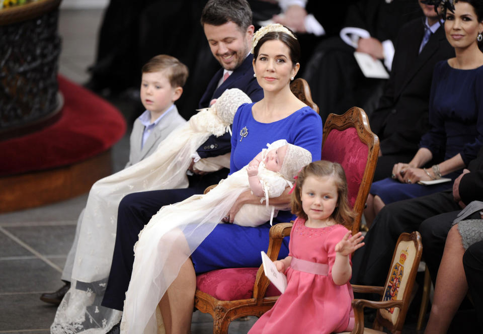 FILE - Danish Crown Prince Frederik and Princess Mary and their children, Prince Christian, and Princess Isabella, at the Copenhagen Navy Church, Holmens, Thursday, April 14 2011, during the baptism of their 3 month old twins. As a teenager, Crown Prince Frederik felt uncomfortable being in the spotlight, and pondered whether there was any way he could avoid becoming king. All doubts have been swept aside as the 55-year-old takes over the crown on Sunday, Jan. 14, 2024 from his mother, Queen Margrethe II, who is breaking with centuries of Danish royal tradition and retiring after a 52-year reign. (Tariq Mikkel /Ritzau Scanpix via AP, File)