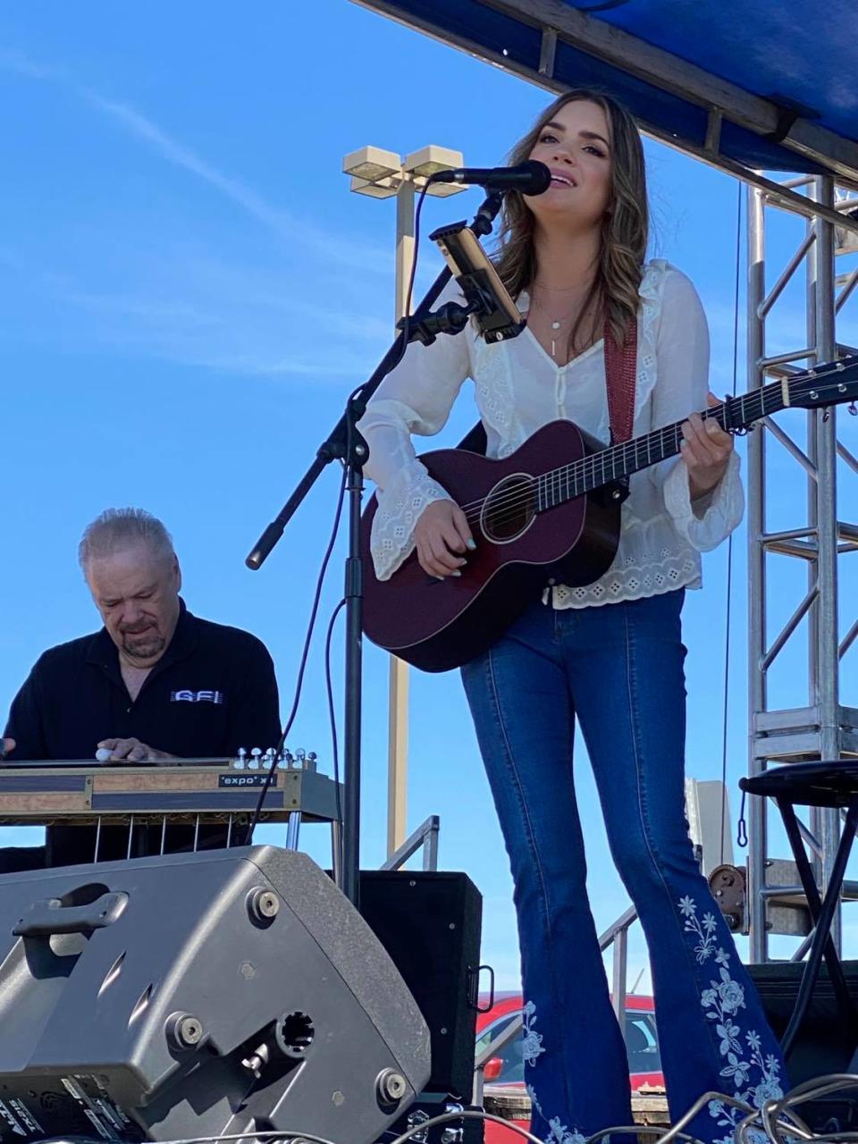 Stark County native Lauren Mascitti, shown performing in Hartville in October, will headline a free concert benefiting first responders on May 21 at Centennial Plaza. The show will feature a new song by the country music artist.