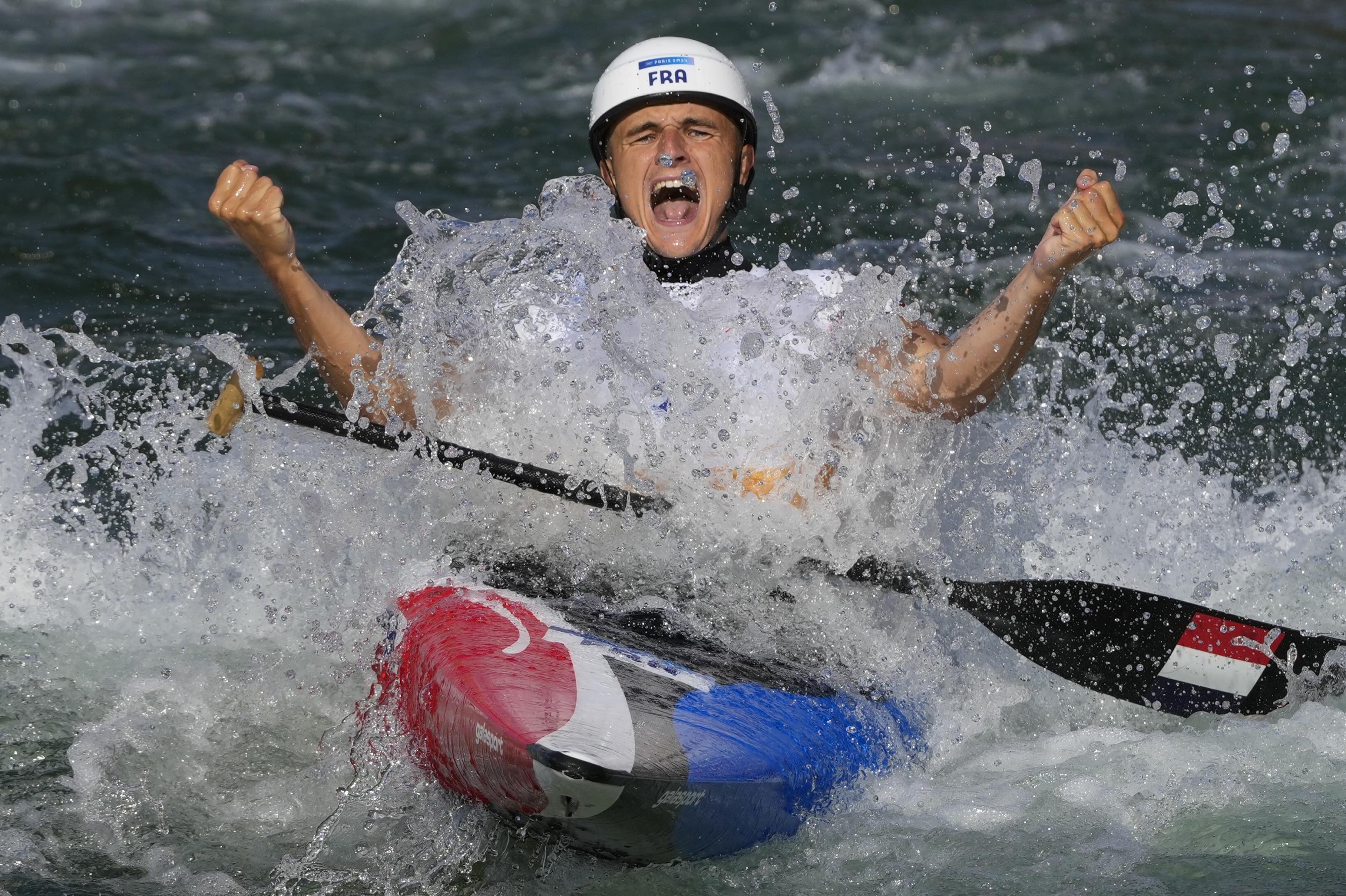 Nicolas Gestin, of France, reacts at the finish line of the men's canoe single finals during the canoe slalom at the 2024 Summer Olympics on July 29, 2024, in Vaires-sur-Marne, France. Gestin won gold. (Kirsty Wigglesworth/AP)