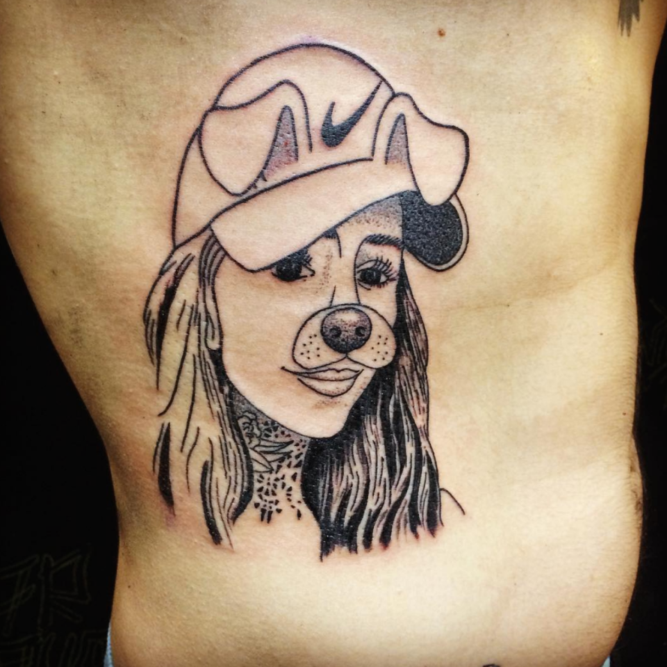 Candelaria Tinelli. Mauro Bravo decidió tatuarse la cara de la hija del conductor más famoso de la Argentina, camuflada con el popular rostro del perrito de Snapchat. - Foto: Instagram.com/mauromarbravo/