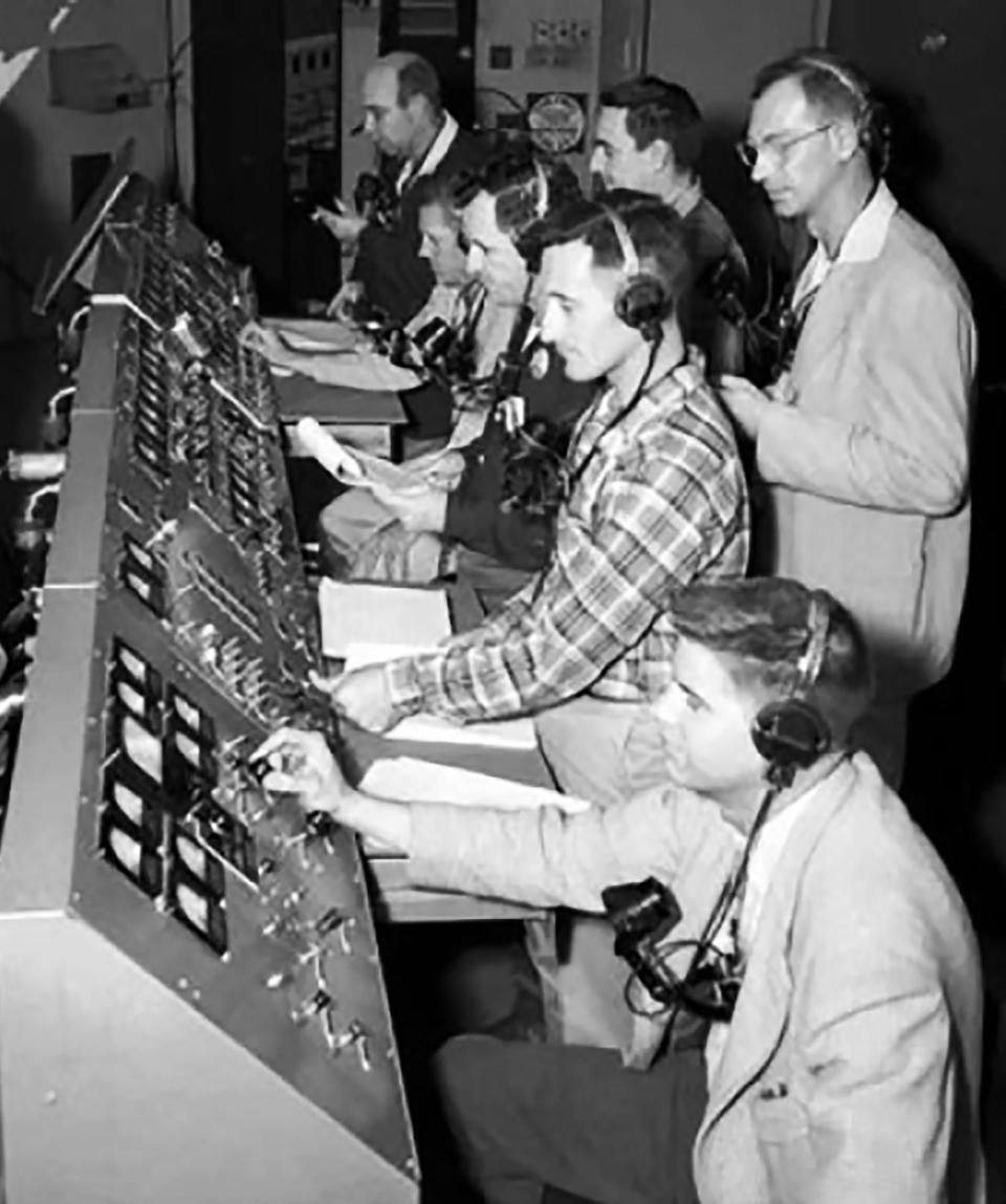 Technicians and engineers monitor the countdown for the liftoff of Explorer 1 in the control room of the blockhouse at Space Launch Complex 26 at the Cape Canaveral Missile Annex