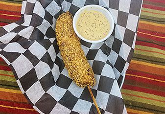 Cajun Style Andouille Sausage Corn Dog with Mardi Gras Mustard Dip

Ragin' Cajun