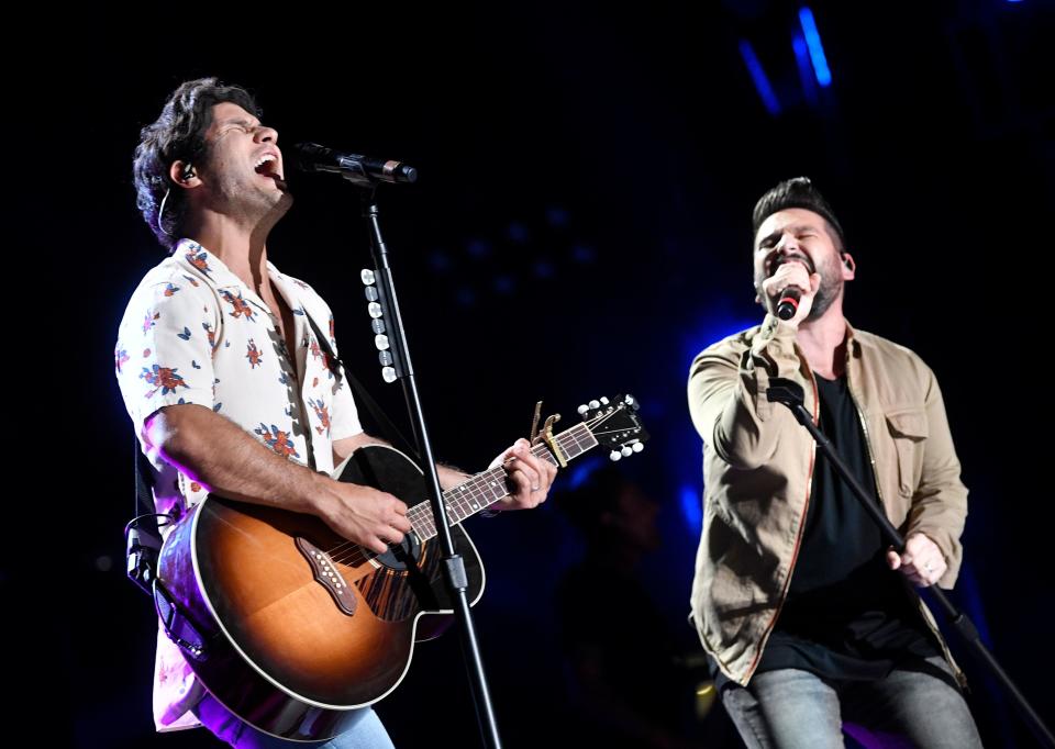 Dan + Shay perform perform at Nissan Stadium during the 2018 CMA Music Festival in Nashville.