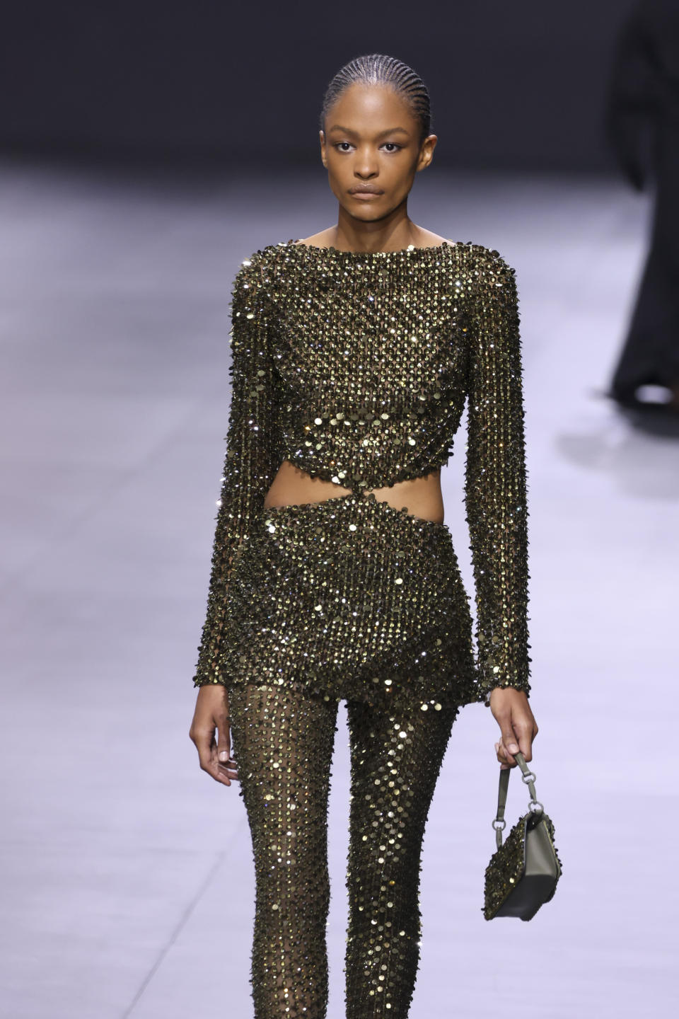 A model wears a creation for the Valentino ready-to-wear Spring/Summer 2023 fashion collection presented Sunday, Oct. 2, 2022 in Paris. (Photo by Vianney Le Caer/Invision/AP)