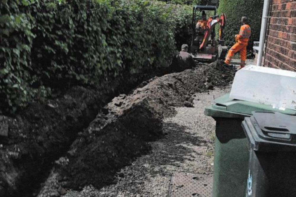 Frank was awoken to find workmen digging up his garden. See SWNS story SWLSdig. A pensioner has been left furious after bungling workmen barricaded him inside his own home when they dug a trench in his garden and driveway. Frank Farmer, 67, was woken up to the sound of diggers tearing up his lawn and patio outside his home in the village of Claines, Worcs. Frank Farmer, of Claines, has spoken about his 