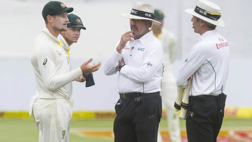 Seen here, Cameron Bancroft is in discussions with umpires during a Test match for Australia.