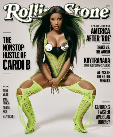 <p>Adrienne Raquel </p> Cardi B on the cover of Rolling Stone