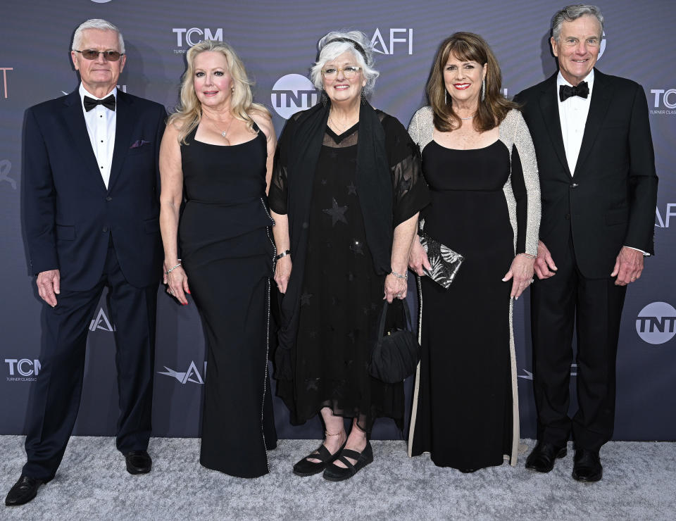 The von Trapps are back! Duane Chase, Kym Karath, Angela Cartwright, Debbie Turner, and Nicholas Hammond pose for photos at the AFI event honoring Julie Andrews. (Axelle / FilmMagic / Getty Images)