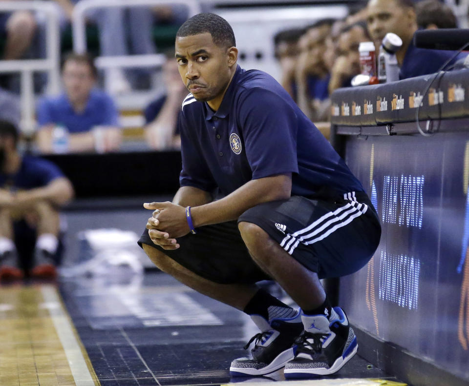 FILE - Utah Jazz coach Johnnie Bryant looks on during the second half of an NBA summer league basketball game against the Boston Celtics, July 5, 2016, in Salt Lake City. The Cleveland Cavaliers added two more candidates to its coaching search Friday, May 31, 2024, receiving permission to interview current New York Knicks assistant head coach Bryant and Miami Heat assistant Chris Quinn, a person familiar with the process told The Associated Press. (AP Photo/Rick Bowmer, File)