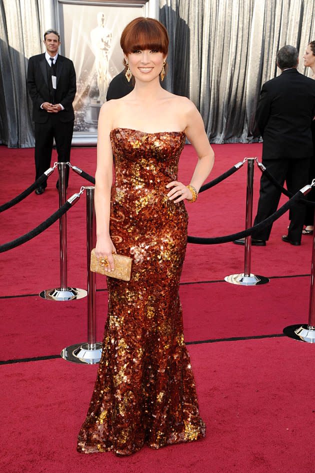 Ellie Kemper <br>Grade: B <br><br>We don’t usually think of Ellie Kemper as being super sexy, but she certainly played the part in this strapless Armani Prive gown, which she described as “glittery rust.” Though the color perfectly matched her fiery-hued hair, the “Bridesmaids” actress’ blunt bangs could have used a bit of a trim, no?